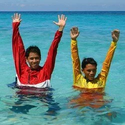 swimming in clothes on the beach