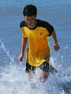 running on the beach fully clothed